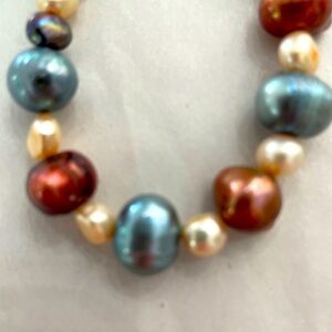 Pearl bracelet various REAL pearls ...barrel, etc. 7" silver toggle closure.